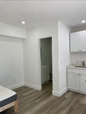 Living space - 1 Bedroom, 1 Bathroom, Kitchen, Washer, Dryer, AC included.