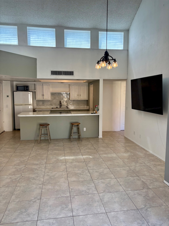 Living room/ Kitchen - Lovely Upstairs Apartment minutes away from campus