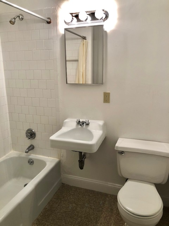 Visit hubrealtyproperties.com - Popular Newbury St furnished studio with large bay windows Apartments