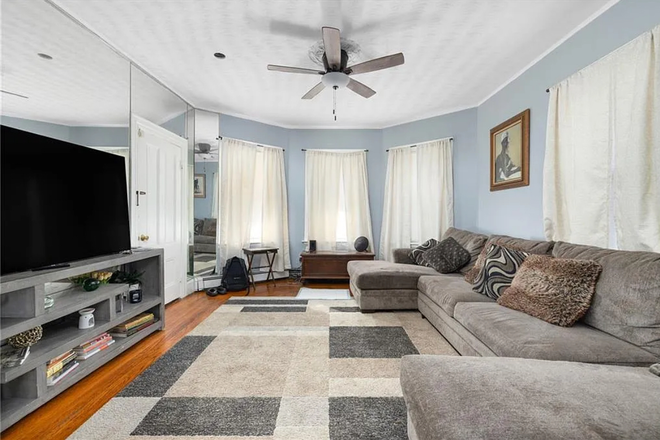 Living Room - East Side 2 bedroom Apt. w/ All Utilities Included