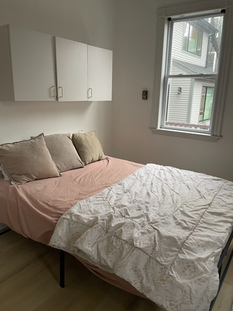 Double bed with storage above bed - 1 Bedroom Suite Available Now - 6 month lease with option to renew