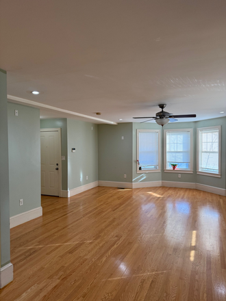 Living room - Modern apartment - 2 bedrooms, 1 bath, dinning and living room, hardwd floors, on street parking.