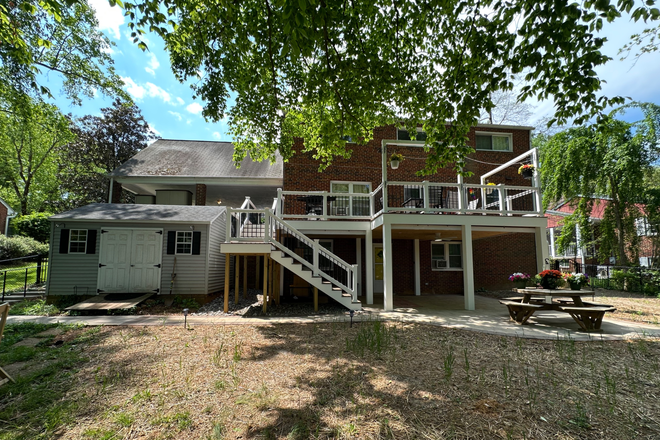 Backyard - Beautiful Home in Old Greenbelt with new deck and patio. 1 block from town center and bus.