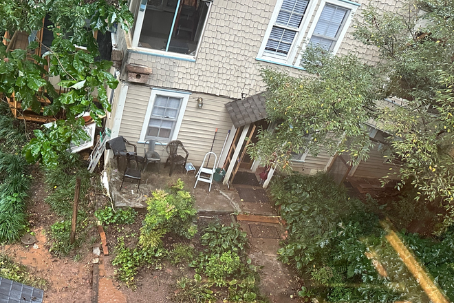 Overlooking entrance - Furnished 1 bedroom basement apartment with kitchenette