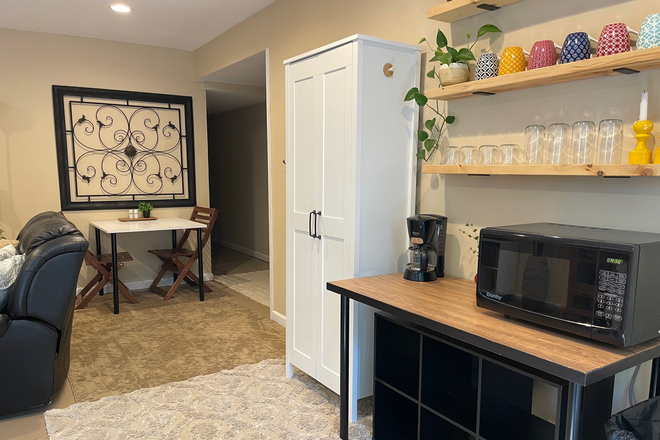 kitchen - clean, well-furnished, separate basement apartment in family home, quiet neighborhood