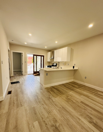 Living Room and Kitchen - Room Rental - Savin Hill | Walk to Red Line | Stainless Steel | Granite | Hardwood Apartments