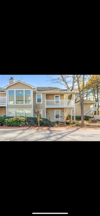 OUTSIDE TOP UNITE - ST. AUGUSTINE PLACE CONDOMINIUM.  Close to campus, dining, shops and highway.