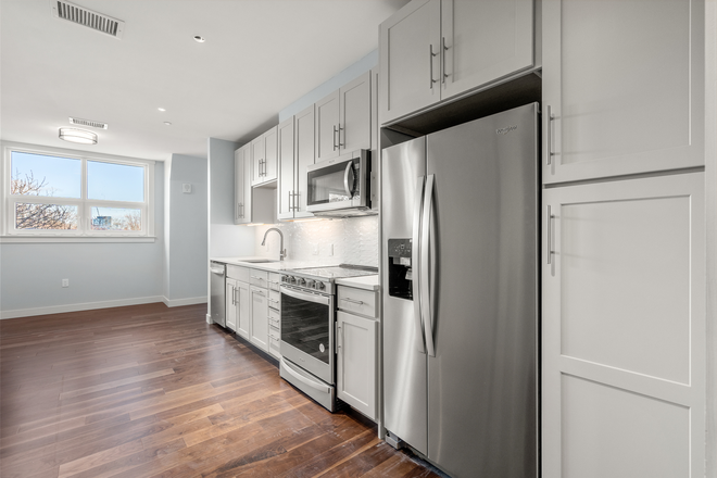 kitchen - Sunny Brookline new construction with AC and in unit laundry for 8/1 - NO FEE!