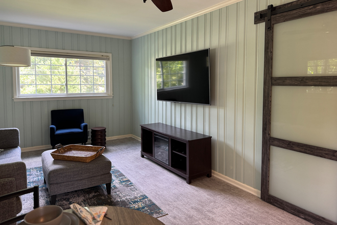 Enjoy your 65-inch smart TV - New, 1 bedroom Terrace apartment in a lovely home and neighborhood, fully furnished, great location