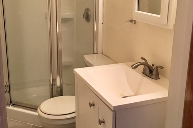 bathroom - Avail 7/1/26 Center of Town, Living room, dinning/kitchen area, walk-in clst, cozy Apartments