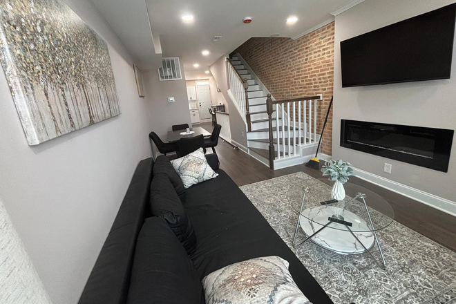 Living Room - Walking Distance from Johns Hopkins--3BR/2.5BA Home | Office Setup, Fireplace, WiFi, Parking & Secu