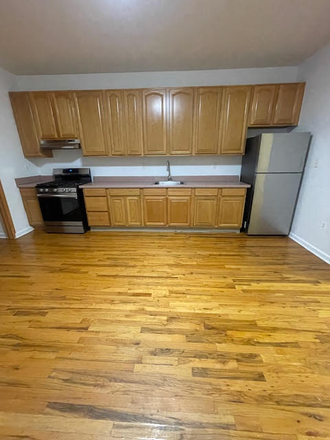 Kitchen area - Street level duplex apartment, private entrance, facing street.