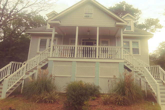 Left front view of house. - Spacious excellent location adjacent to downtown, 6 minutes away. House