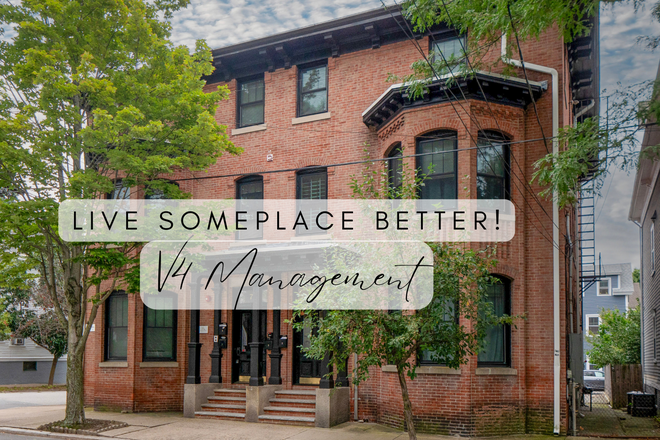 V4 Management - Historic building fully updated with AC, in unit laundry, balcony
