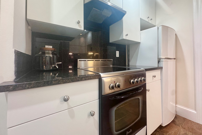 Kitchen - Pristine Studio Walking distance to Emerson