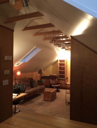 Living room and desk area. Furniture included - Studio Apt near Lanza's Cafe