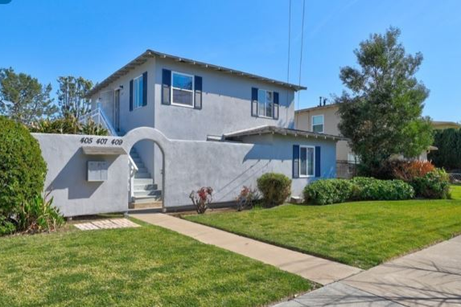 Front of Triplex. Unit is the top one - 2 Bedroom 1 Bath Upstairs Unit in Triplex close to campus. Fenced yard & newly remodeled Triplex