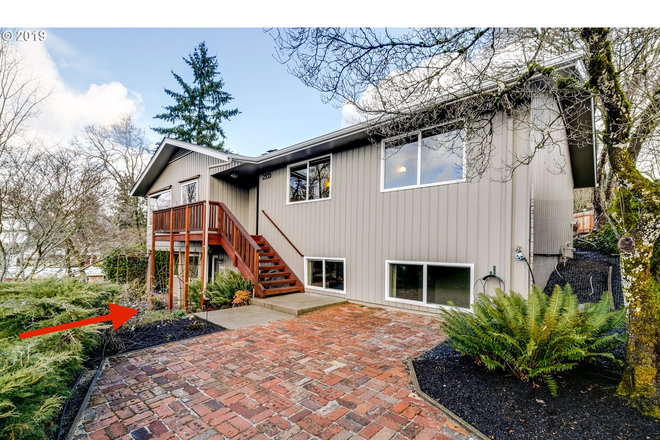 Unit and main house entry (see red arrow) - Centrally Located, Stylish 1 BR/1 BA Apartment with Outstanding Views