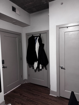 Closet door is middle and bathroom is in the room with the right door. - TENN Student Living Apartments