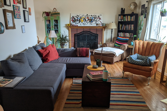 Living room with fireplace--house is unfurnished - 4 Bedroom 2.5 bath home with yard available