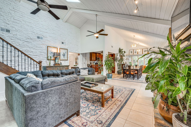 Main living area - Restorative 4BR Retreat: Private Pool, Native Gardens, and Workspace near Universal/Disney House