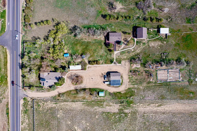 Aerial from above - Highland: Group Living 3.7 acres on hill overlooking Boulder House