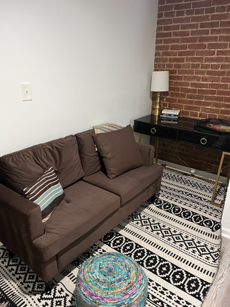 Living Room - Furnished 1BR/1BA Apartment