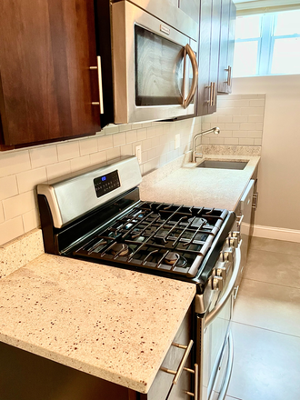 Stainless steel appliances and gas stovetop - GLOVER PARK 1BD/1BA — CLOSE TO CAMPUS | Utilities Included | Avail June 1 Condo