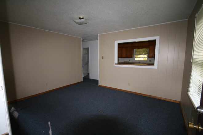 LR from front door - Beautiful,  private 2 br. cottage in 10 cottage creekside community. 1.5 miles to WCU. Apartments