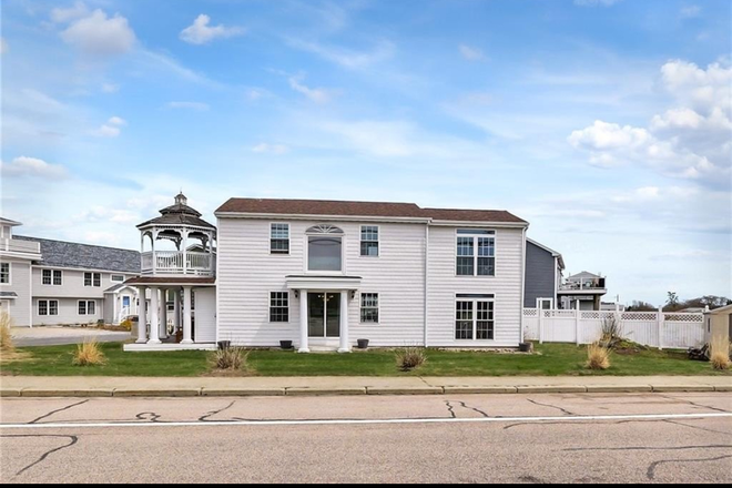 Outside street view - New Listing. Water views and walk to beach House