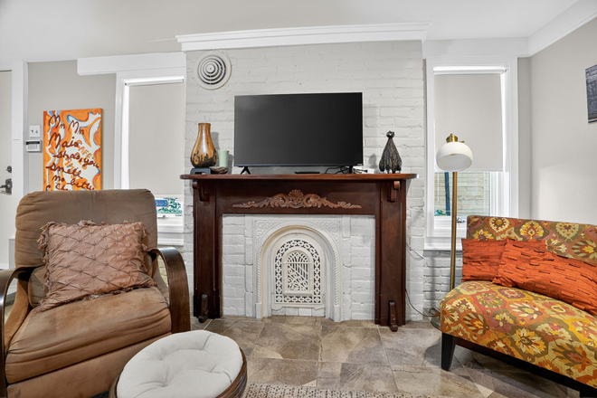 Living Room with Smart TV - 2 Bedroom Nicely Furnished Apartment with Utilities Included