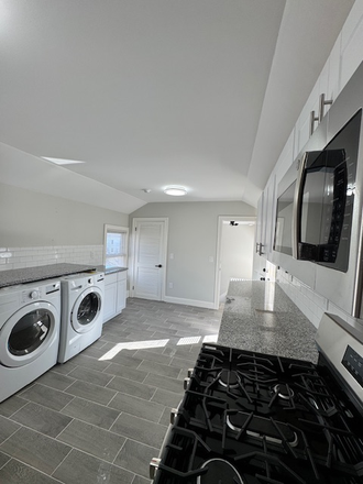 washer and dryer in kitchen - 3 bed with office and 1 bath newly renovated.