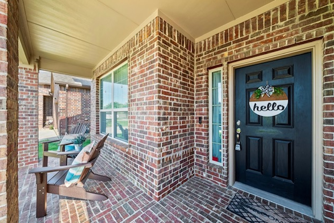 Front outside entrance - Beautifully Maintained 4 Bedroom, 2 1/2 bath home with gorgeous outdoor living space