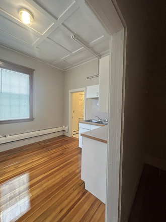 kitchen - Avail. 7/1/26 High ceilings, wood floors, located in the center of town, tile bathroom