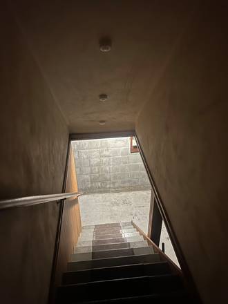 Stairs to the basement - House 10 Minutes from Campus
