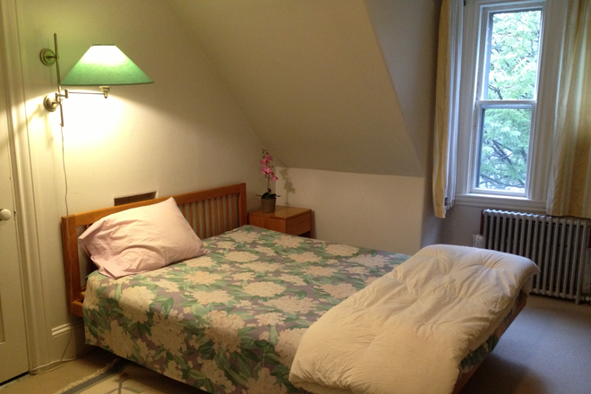 Bedroom  10x12 with desk & closets - Daylight-filled, Furnished, One Bedroom Suite, One Block to T and Stores, All utilities Included House