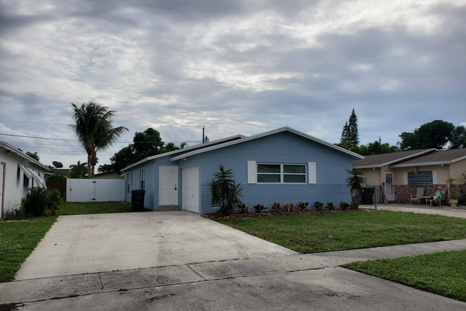 Front view - Updated single family home in East Boca