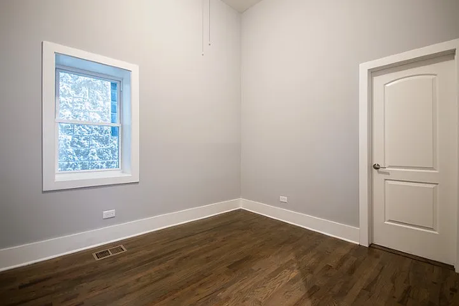 Bedroom 1 - 1711 S Carpenter St, 1F Apartments
