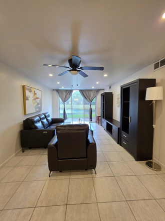 Fully Furnished living area - Cascades Condo
