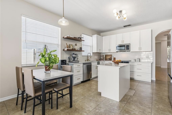 kitchen - Two Unfurnished Rooms Modern Updated 4x2 House Female Only– 6 Minutes from UCF - Utilities Included