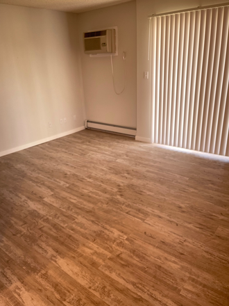 Living Room - 25/26  - Studio, 3BRs  Just Off Campus Apartments