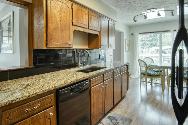 Kitchen - Located in Omaha 10 min from UNO and 15 Min from Creighton just off I-80 Very easy access to I-80 Duplex