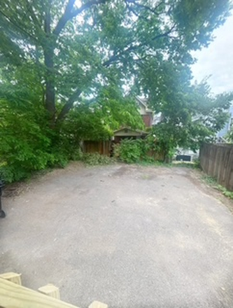 Parking behind house - NEWLY RENOVATED- 4 Bedroom, 2.5 bath, off street parking, walking distance from UC Campus House