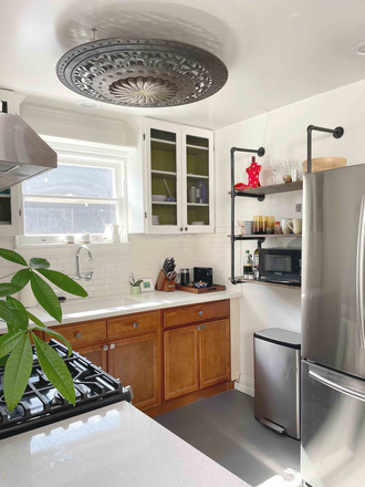 Kitchen. Stainless steel appliances - Light and Bright cottage, walking distance to Chapman University. Furnished or Unfurnished Apartments