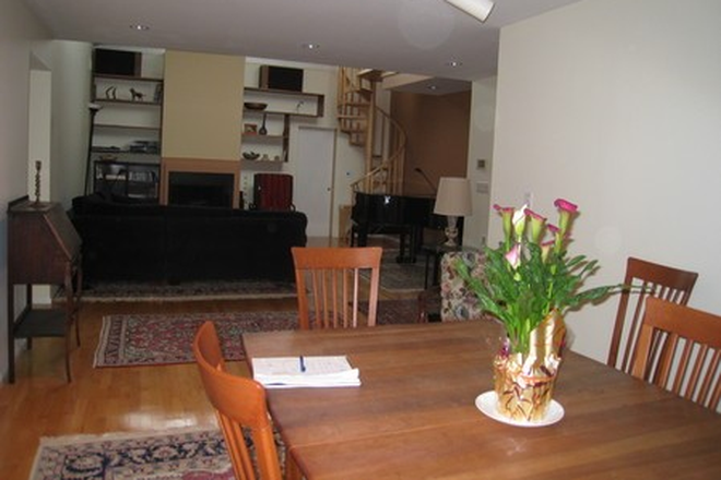 Dining room into living room - Furnished penthouse room near Law School; Ideal for ALI Fellows