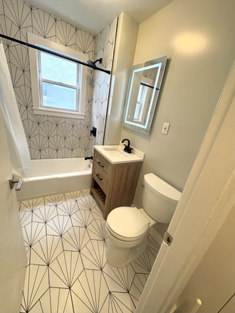 NEW BATHROOM - **NO BROKERS FEE!!** Spacious 4-bedroom Medford apartment - Avail. 6/1/2026!