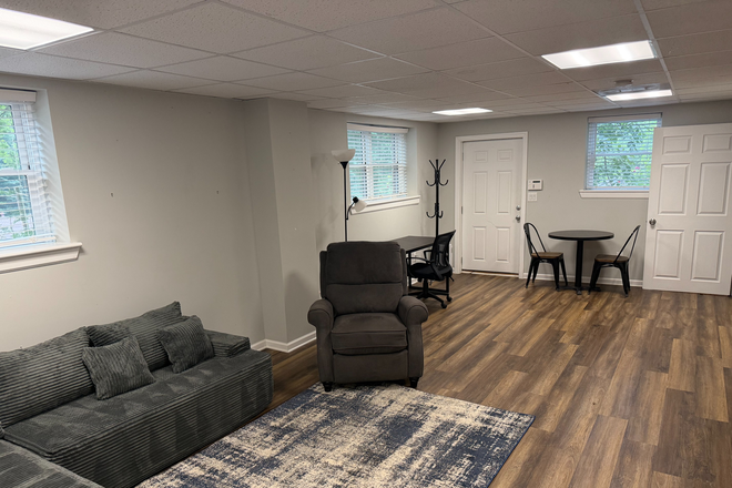 Living area, desk, cafe table and chairs - Very nice one bedroom, daylight basement apartment.