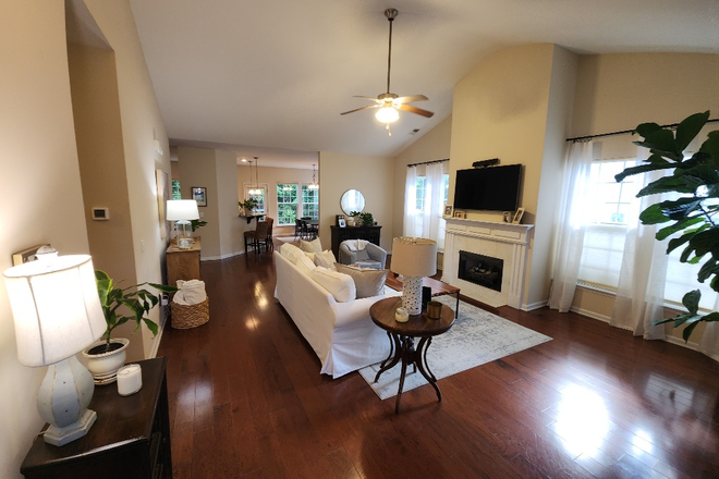 Family room w/gas fireplace - Fenwick Commons: 2 BR, 2 Bath one story townhouse w/appx. 1638 sq. ft and a single car garage