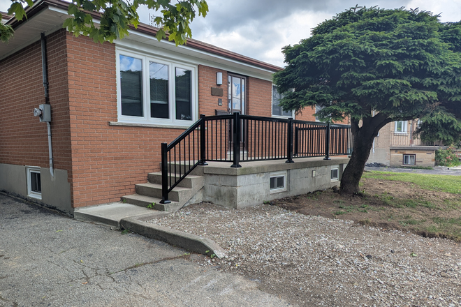 Front of house and entrance.  Still under construction outside - 2 bedroom in North York, living room, Kitchen, bathroom and laundry room.  All utilities included. House
