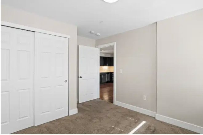 Bedroom - East Village Flats Apartments